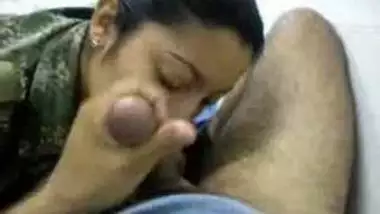 Asian girl in army uniform sucking cock