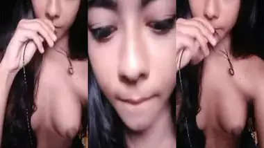 Sexy teen displaying her nude boobs on a live call