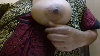 Desi mom self records her boobs press for her bf..son gets this video from her mobile