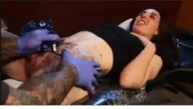 Girl Getting Tattoo Around Shaved Pussy