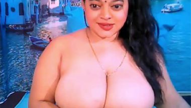 Indian slut sits in front of webcam with naked massive natural tits