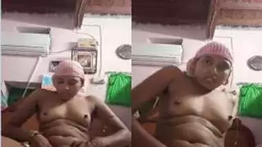 Naked Desi wears a pink towel on head and masturbates pussy
