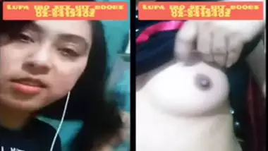 Indian beauty can't resist touching tits during a video call