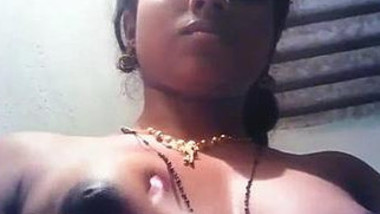 Indian colleen puts her XXX dark nipples in camera performing sex show