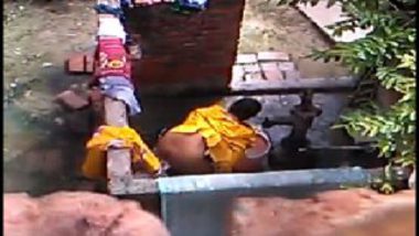 Indian village aunty open bathing video recorded