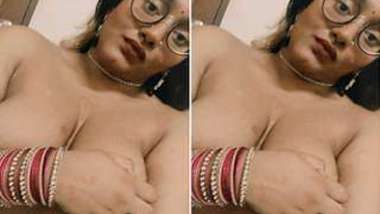 Young Desi woman skillfully plays with naked XXX tits for subscribers