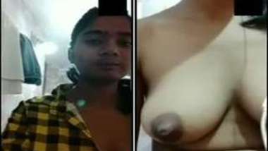 Indian teen listens to music while showing her XXX tits and peach