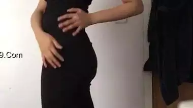 Indian woman with sexy body wears black dress that makes her look hot