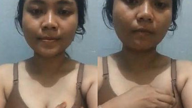 Pleasant Indian girl squeezes left breast and it also can be called porn
