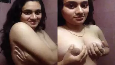 Cute Desi girl strips and makes porn selfie