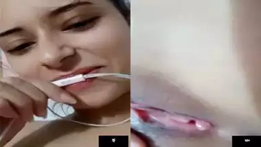 Cute skinny girl fingering her small pussy on VC