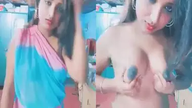 Desi girl pumping her bosoms and fingering pussy hard