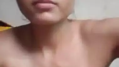 Cute Desi village girl displays her XXX assets being alone at home