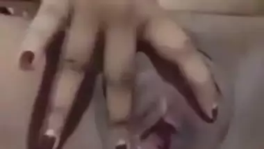 Village girl spreading her shaved pussy