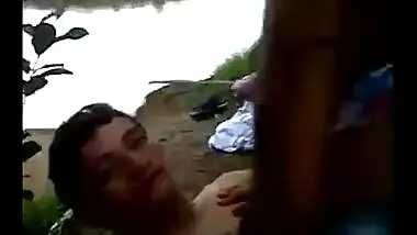 Beautiful teen girl rides her boyfriend in an outdoor sex session
