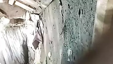 Village neighbor girl outdoor bath caught through hole