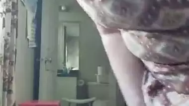 Indian aunty vacuuming
