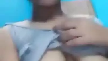 Horny Girl Showing Huge Tits and Fingering