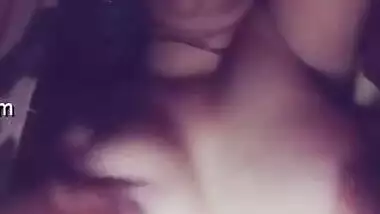 Indian aunty squeezes her own boobs like crazy in close-up video
