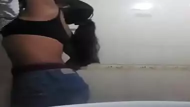 Slim Indian girl sneaks in bathroom to film solo porn clip for BF