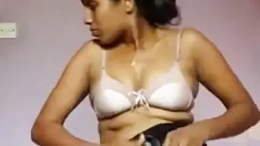 Desi girl stripping and masturbating with a big black dildo