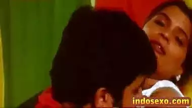 Indian older woman's boobs get licked with honey by young guy