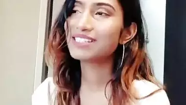 sexy desi babe singing showing her hot clevage