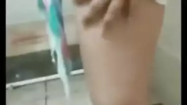 Naughty Indian girl sneaks in bathroom for sex video chat with XXX friend