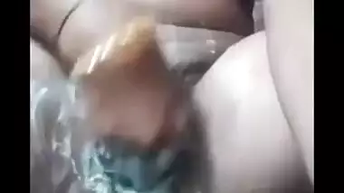 Inventive Indian housewife combines bathing with pussy fingering