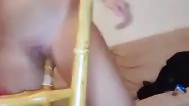 Crazy wild girl fucks her pussy with a chair leg