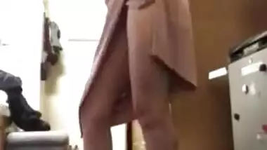 Long-legged Desi girl takes off a dress to impress men in solo porn video