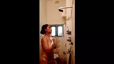 Pretty Desi woman carefully washes XXX assets in shower sex video