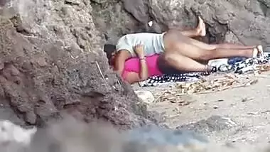 Indian blue film of a young couple enjoying outdoor sex on the beach