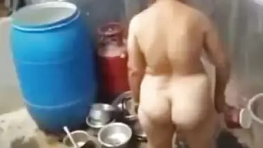 Video from hidden cam, village aunty taking bath in outdoor taken by her son