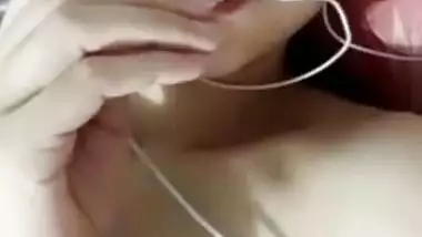 Cute skinny girl showing her small tits on VC