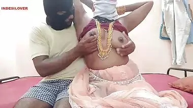 Mustached man in a mask and Desi XXX partner have sex on the camera