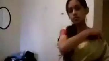 Cute girl stripping off her sari and showing off