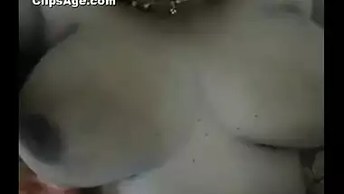 Big boobed Bangladeshi lady pressing her boobs together while getting fucked