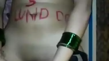 Sexy desi wife mastrubating with brinjal written on body mujhe