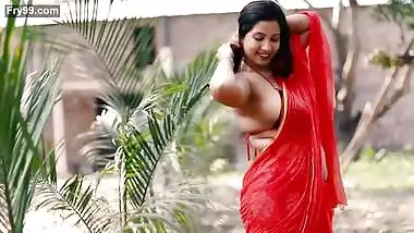 Nandita Showing Deep Cleavage and Navel in Low Waist Red Saree