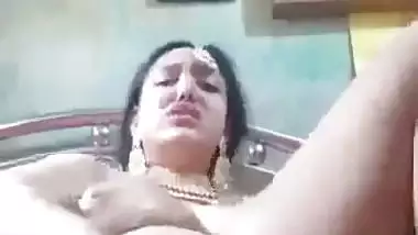 Newly married nude desi lady fucks her pussy with a banana