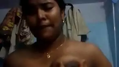 tamil teen squeezing her boobs with hot expression