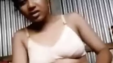 Beautiful Desi XXX girl fingering her teen pussy in the garage