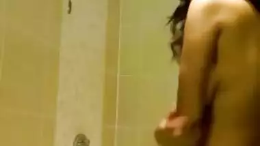 Sexy desi babe enjoys a nice cold shower in a hotel