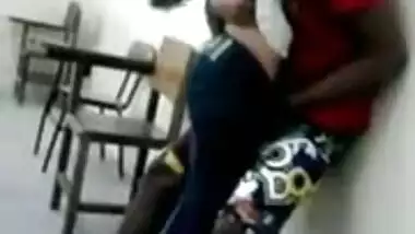 Young India College girl kissing in classroom