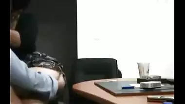 Hidden web camera catches a older doxy enjoying office sex