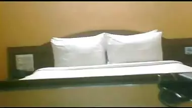 indian couple in hotel room enjoying sex after busy day