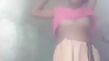 Charming village girl strips to show her pink Desi XXX pussy at home