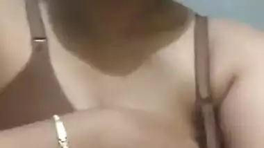 Pleasant Indian girl squeezes left breast and it also can be called porn