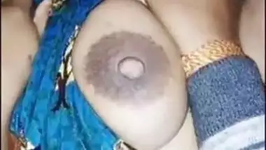 Squeezing boobs of sleeping wife